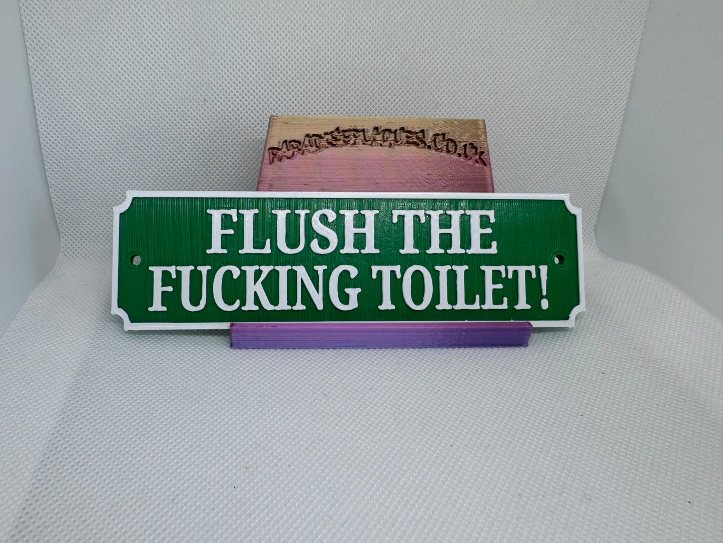 Flush the fucking toilet plaque